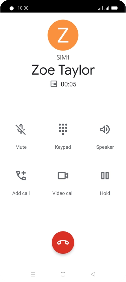 Press the end call icon.