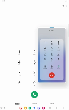 Press the end call icon.