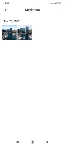 Press and hold any picture or video clip. Press and hold any picture or video clip.