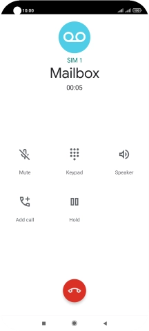 Press the end call icon.