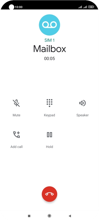 Press the end call icon.