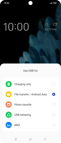 Press File transfer / Android Auto. Press File transfer / Android Auto.