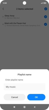 Key in a name for the playlist and press OK.