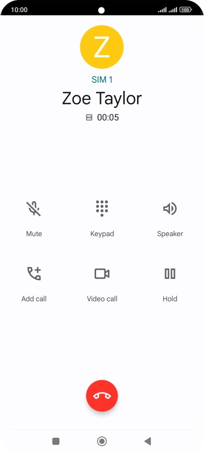 Press the end call icon.
