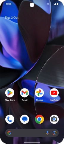 The alarm icon shows that the alarm is set.