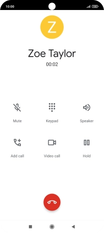 Press the end call icon.