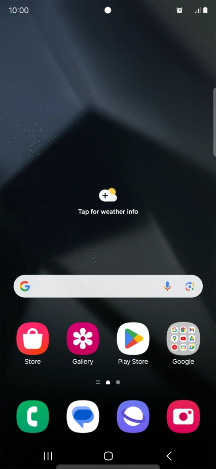 The alarm icon shows that the alarm is set.