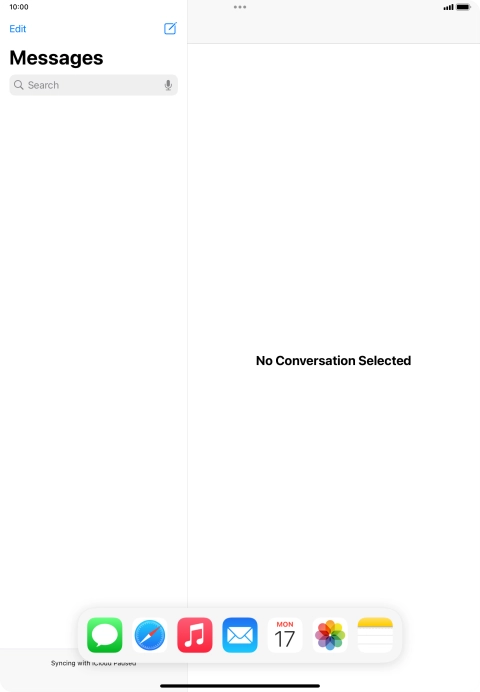 Slide your finger downwards on Dock to minimise it.