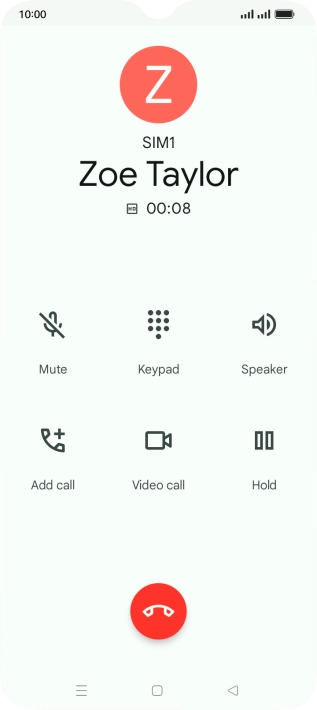Press the end call icon.