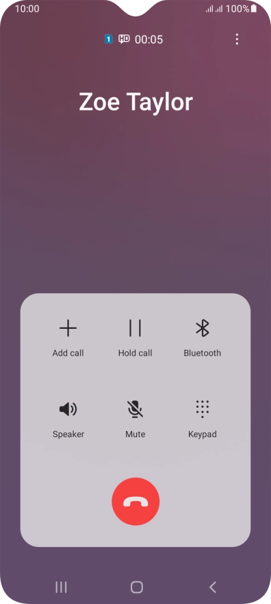 Press the end call icon.