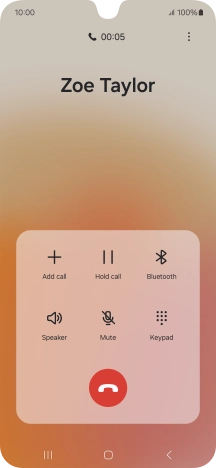 Press the end call icon.