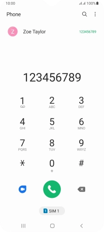 Key in the required number and press the call icon next to the required SIM.
