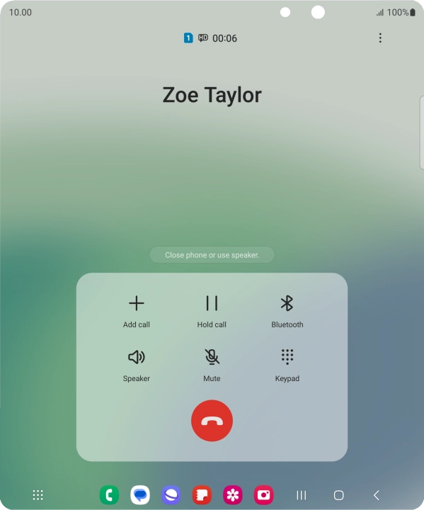 Press the end call icon.