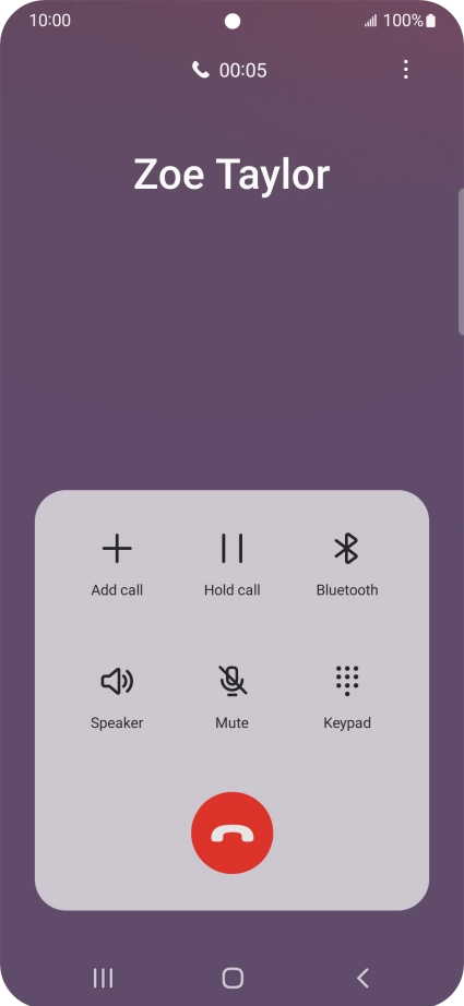 Press the end call icon.
