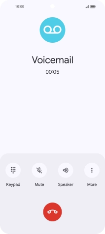 Press the end call icon.