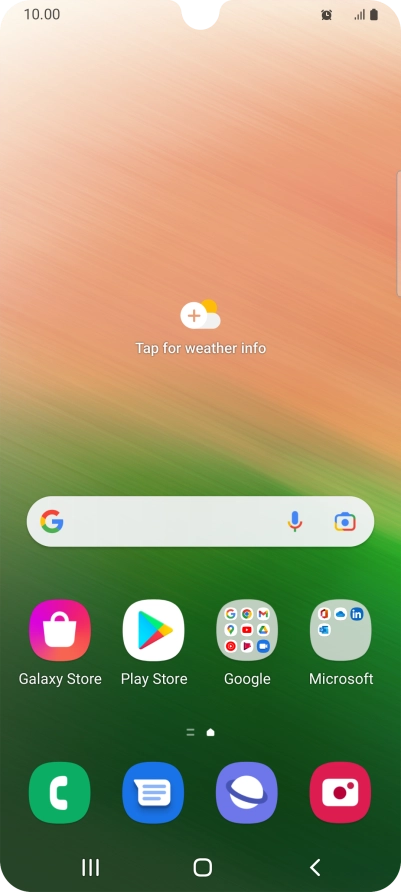 The alarm icon shows that the alarm is set.