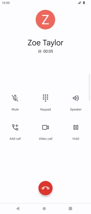 Press the end call icon.