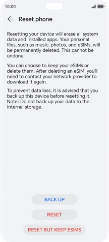 Press RESET. Wait a moment while the factory default settings are restored. Follow the instructions on the screen to set up your phone and prepare it for use.