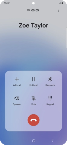 Press the end call icon.