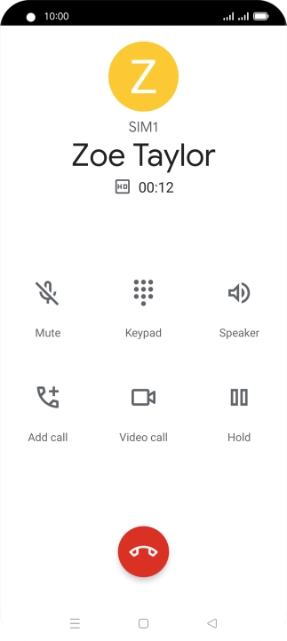 Press the end call icon.