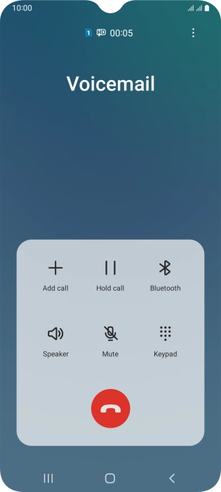 Press the end call icon.