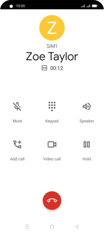 Press the end call icon.
