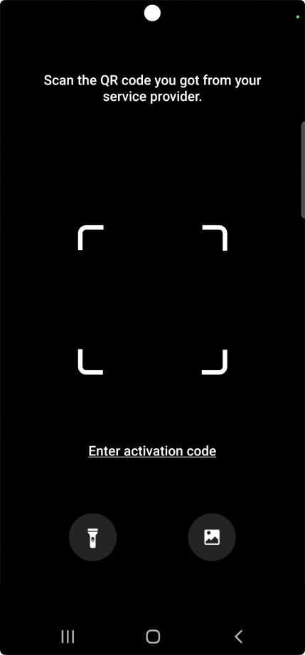 Place the QR code you've received inside the phone camera frame to scan the code. Your eSIM is transferred to your new phone over the internet.