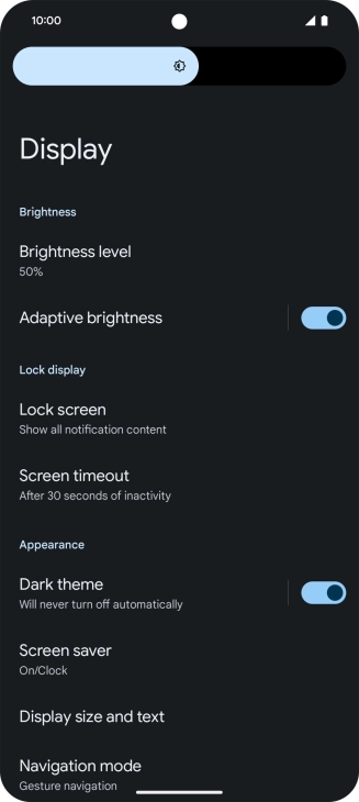 Drag the indicator right or left to set the brightness manually.