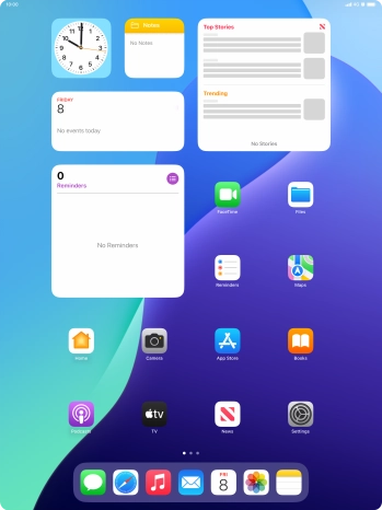 The alarm icon shows that the alarm is set.