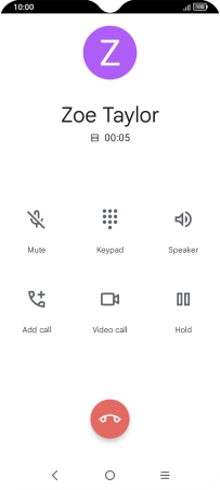Press the end call icon.
