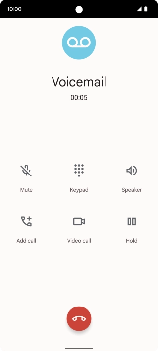 Press the end call icon.
