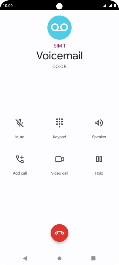 Press the end call icon.