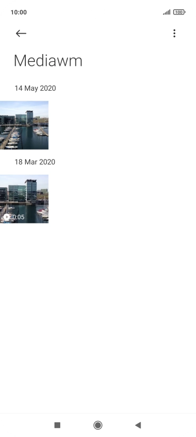 Press and hold the required picture or video clip. Press and hold the required picture or video clip.