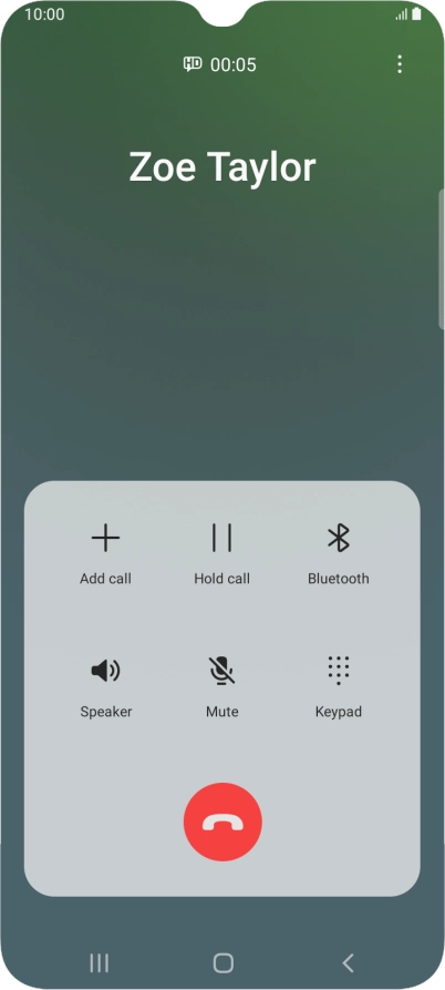 Press the end call icon.