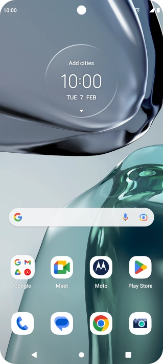 The alarm icon shows that the alarm is set.