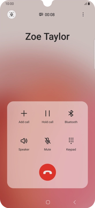 Press the end call icon.
