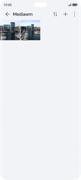 Press and hold any picture or video.