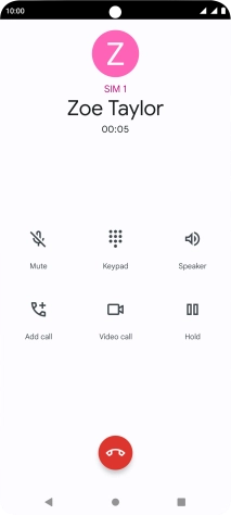Press the end call icon.