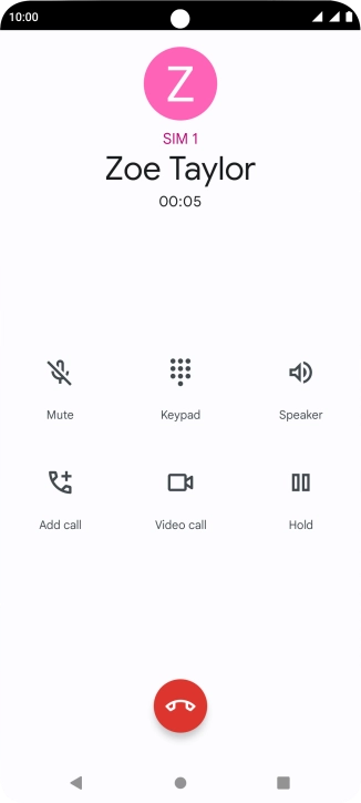 Press the end call icon.