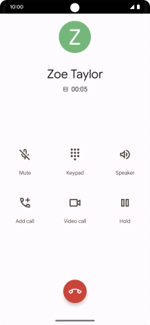 Press the end call icon.