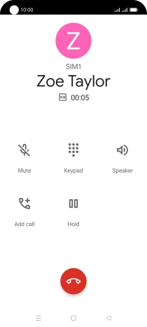 Press the end call icon.