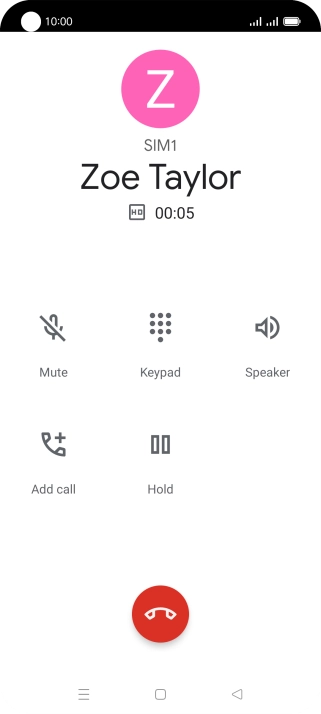 Press the end call icon.