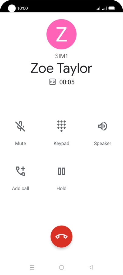 Press the end call icon.