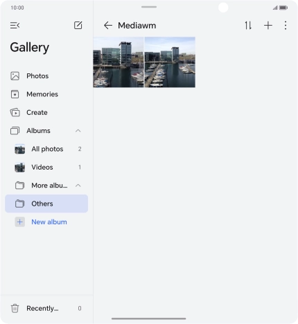 Press and hold any picture or video.