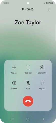 Press the end call icon.