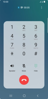 Press the end call icon.