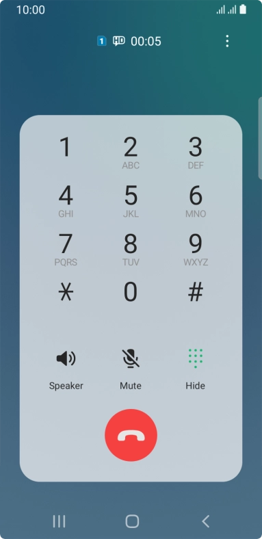 Press the end call icon.