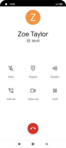 Press the end call icon.