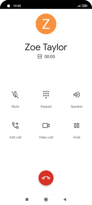 Press the end call icon.