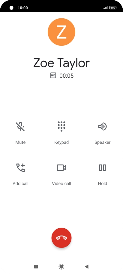 Press the end call icon.
